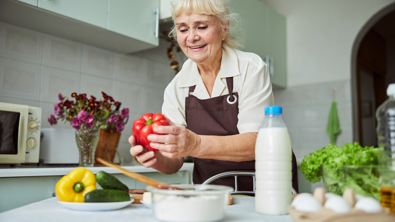 Caregiver discussing home safety improvements with a senior homeowner
